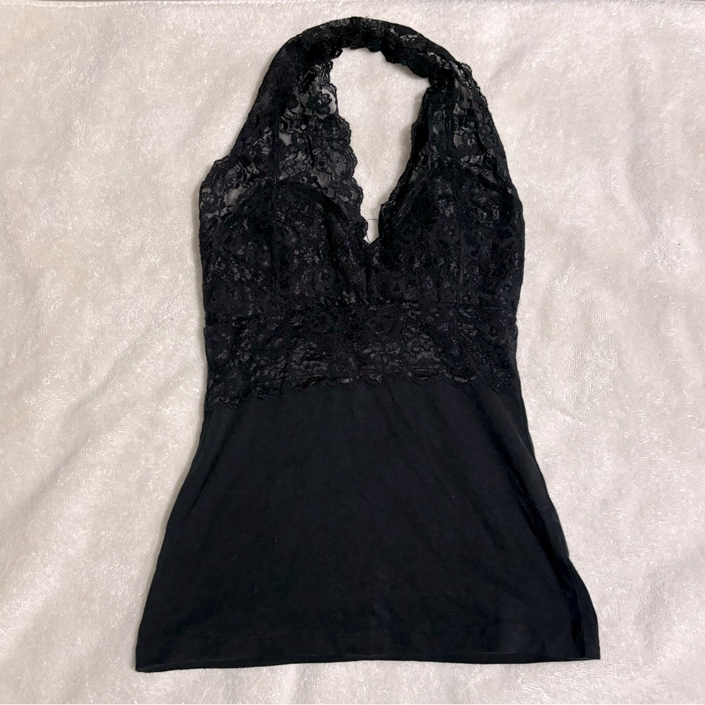 Top is laced and bottom is regular cover. Goes over the neck. Slim fit.